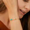Elegant thin gold cuff bracelet with natural turquoise and opal stones