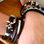 Leather wrist band with metal 4 band bead trim